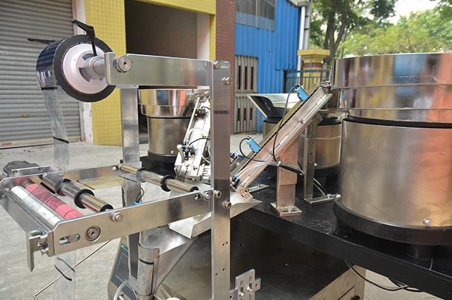 多物料自動包裝機裝膜系統(tǒng)機器結(jié)構(gòu)配件